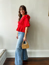 Raven Peplum Top